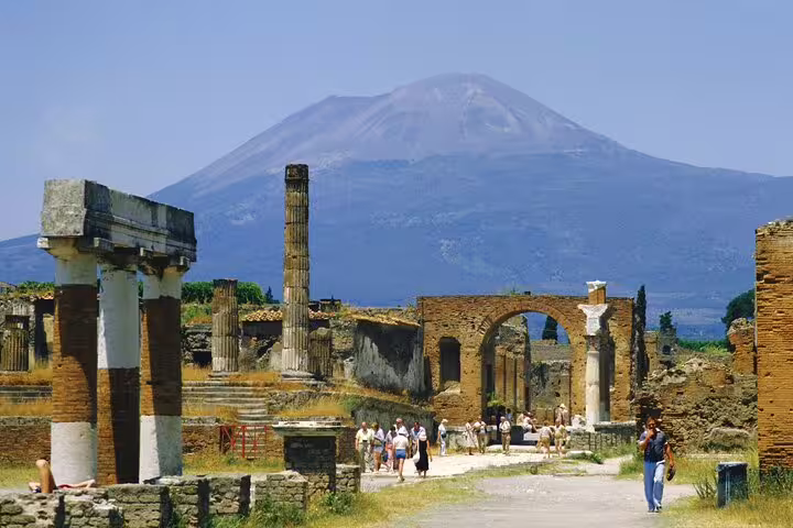 Pompeii archaeological site with Mount Vesuvius view, part of a private Naples to Sorrento and Amalfi tour