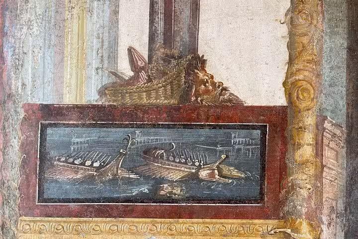 Ancient fresco in Pompeii depicting naval scene, highlighting the artistic heritage explored on the Positano to Pompeii tour.