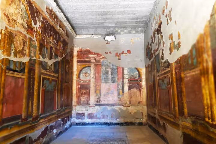 Explore the vivid frescoes of ancient Pompeii during your skip-the-line tour from Amalfi and Positano.