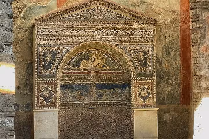Intricate mosaic archway in Pompeii captured during a 2.5-hour guided tour with an expert archaeologist.