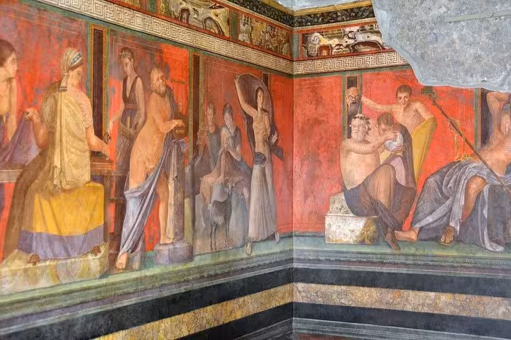 Vibrant frescoes depicting ancient Roman life in Pompeii's Villa of the Mysteries, perfect for cultural enthusiasts.