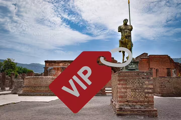VIP small-group Pompeii ruins tour from Naples with skip-the-line ticket, statue in ancient forum