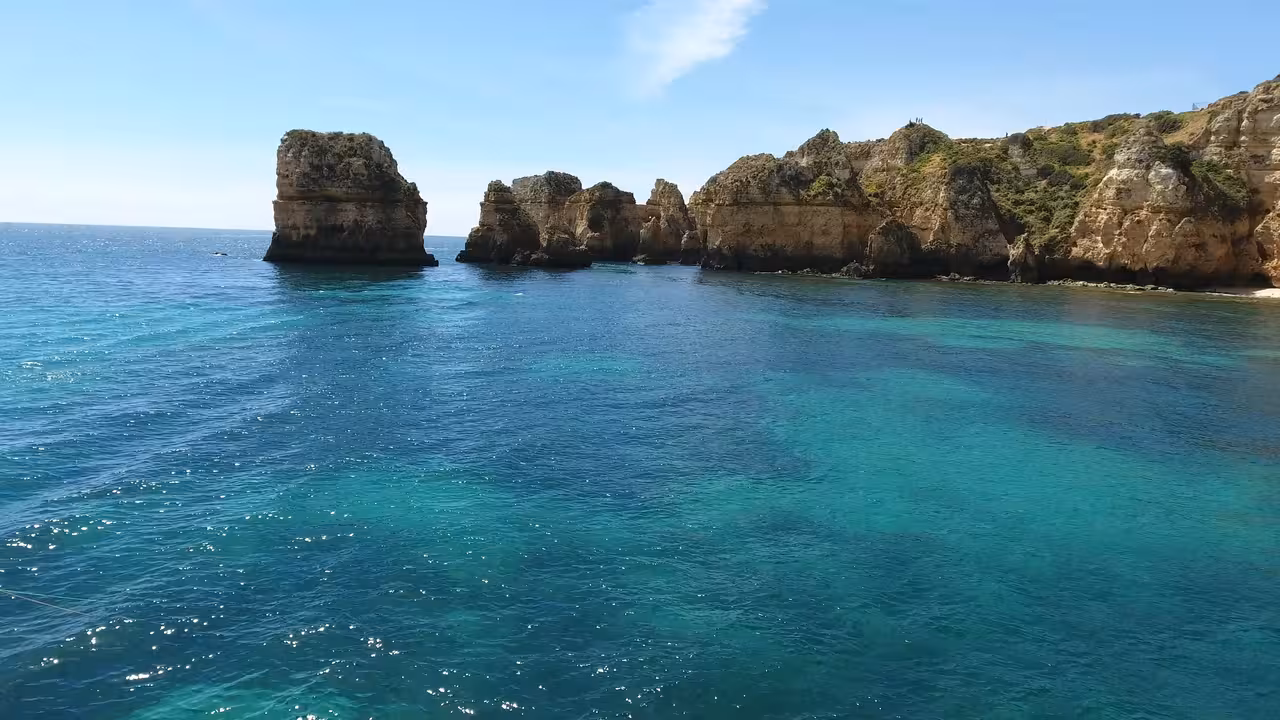 Panoramic view of Ponta da Piedade sea stacks and clear Algarve water on a 2-hour boat caves trip, Lagos