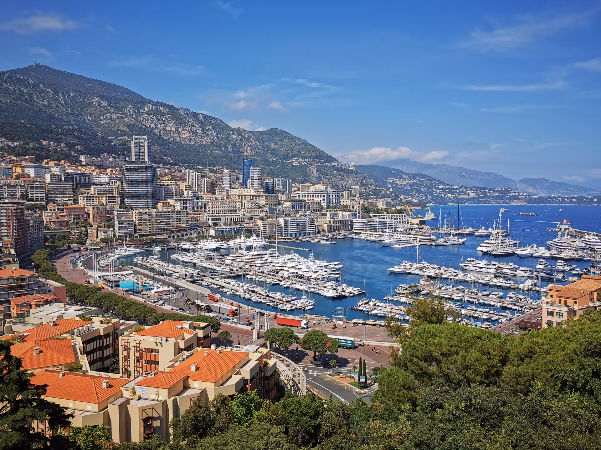 Panoramic view of Port Hercule Monaco yachts and skyline on private day trip from Marseille to Nice, Eze and Monaco