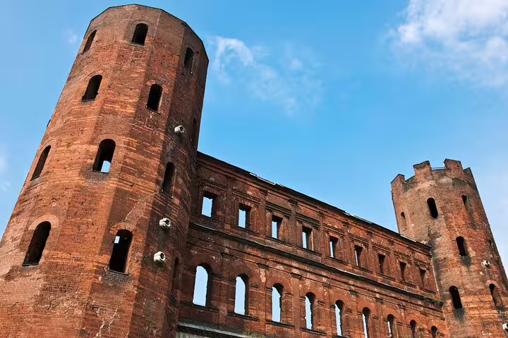 Porta Palatina Roman towers in Turin, a key stop on a self-guided scavenger hunt and highlights tour