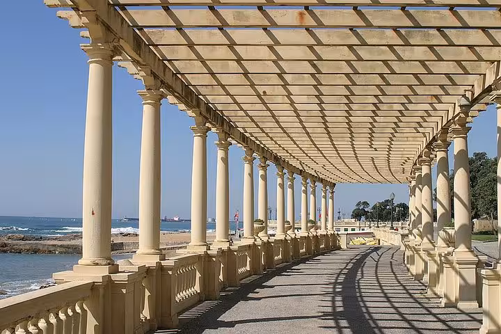Beachside small-group tour in Porto featuring seaside pergola promenade with Atlantic views near Foz do Douro
