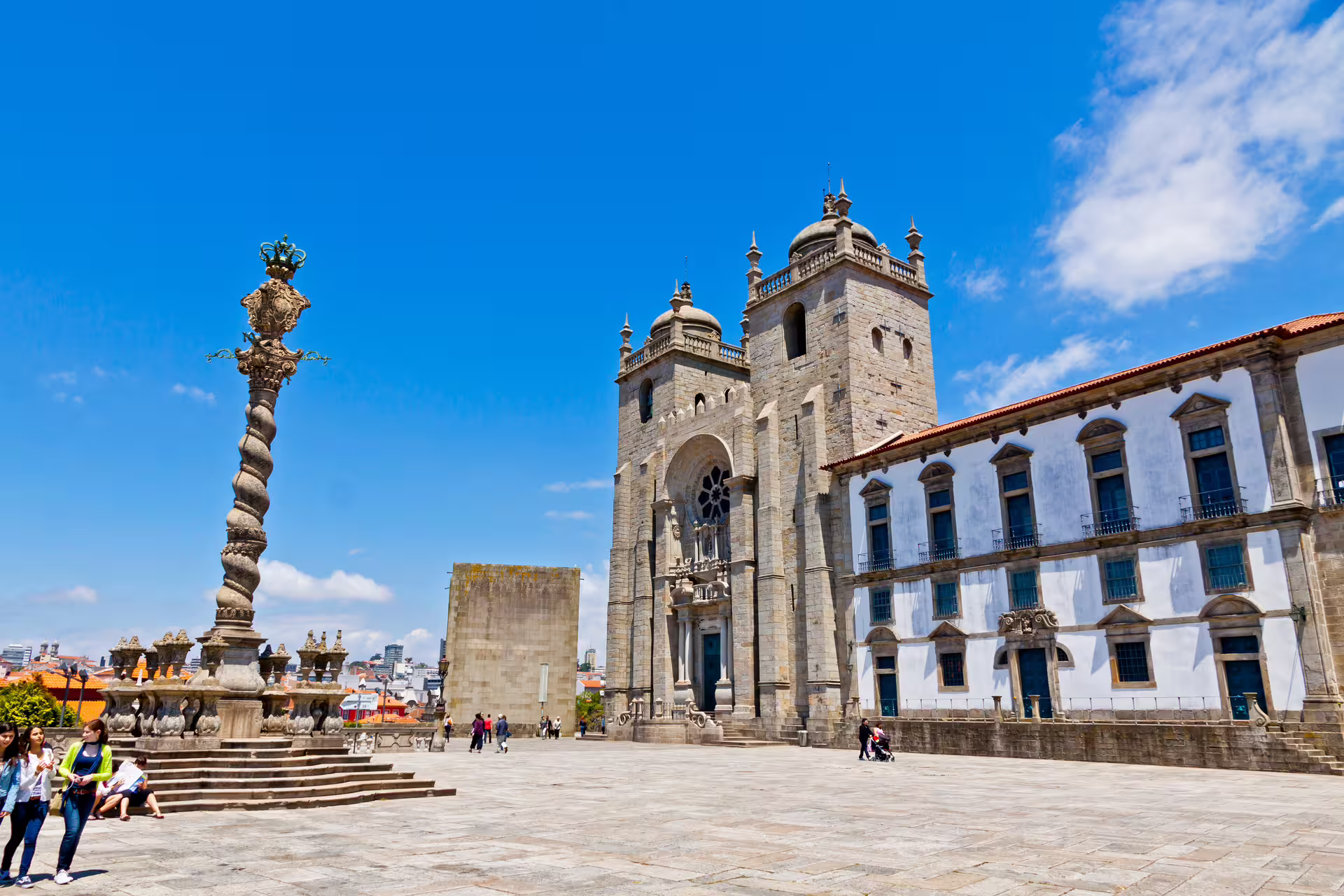 Majestic Porto Cathedral under a clear blue sky, offering a glimpse into Portugal's rich architectural heritage.