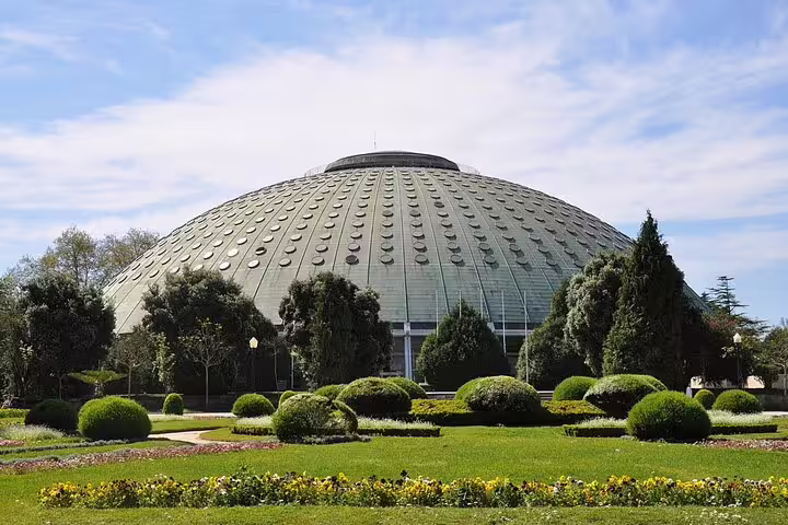Explore Porto's iconic Crystal Palace Gardens with a full-day private tuk tuk tour, showcasing lush landscapes and stunning architecture.