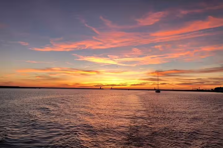 Scenic Douro River sunset views with vibrant skies on a private tour, ideal for an unforgettable sea and sunset experience.