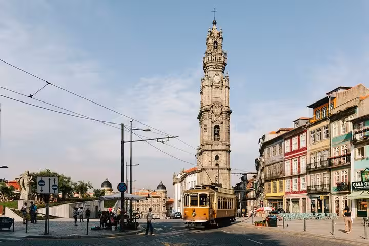 Explore Porto's iconic Clérigos Tower and historic tram on an e-bike tour with a local guide through the city center.