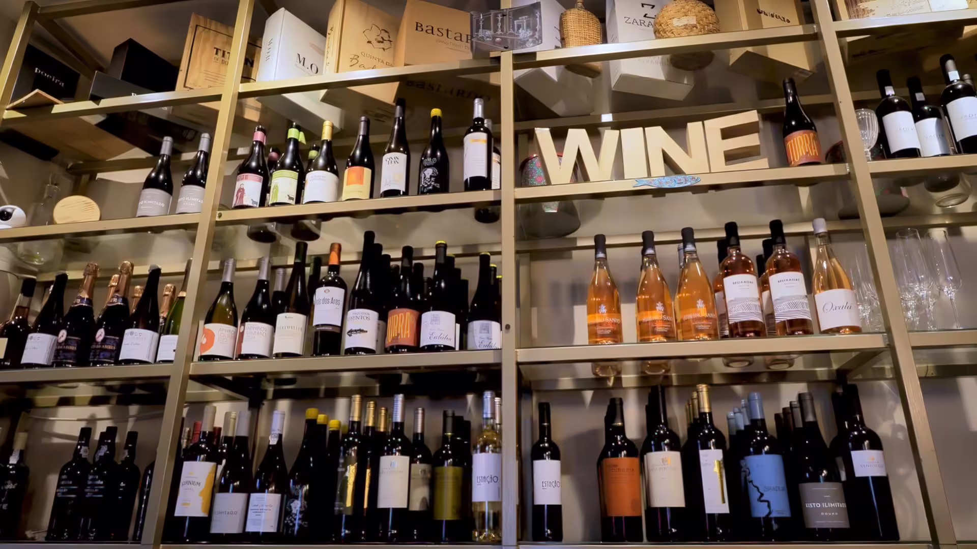 Image of premium wines on display at a wine bar, part of Cooltour Oporto's Porto Fado & Wine Tour
