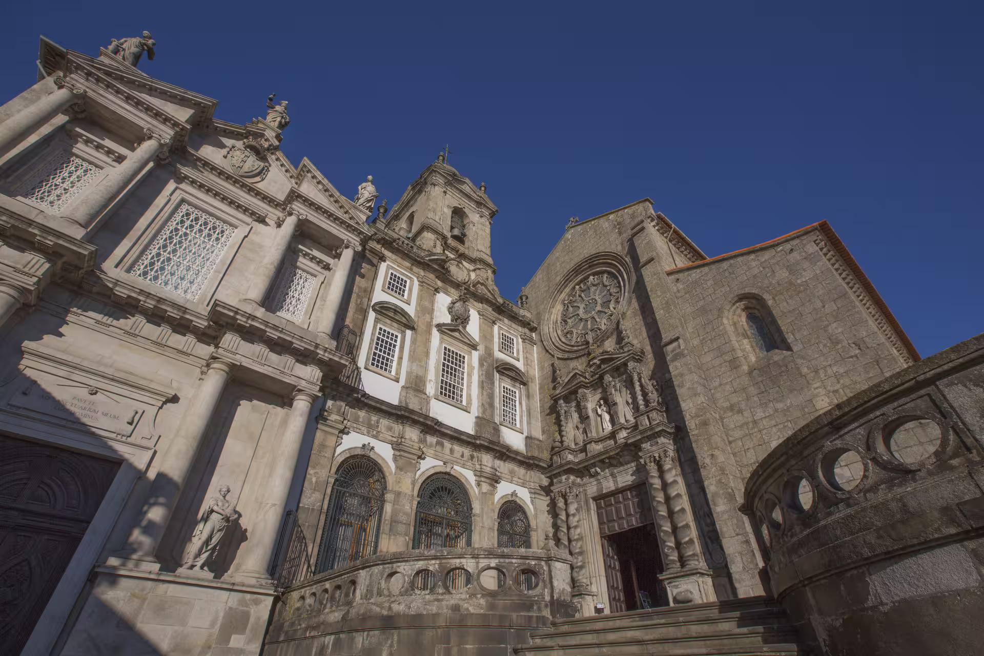 Historic Porto church facade under a clear blue sky, featured on our must-see small-group walking tour of Porto.