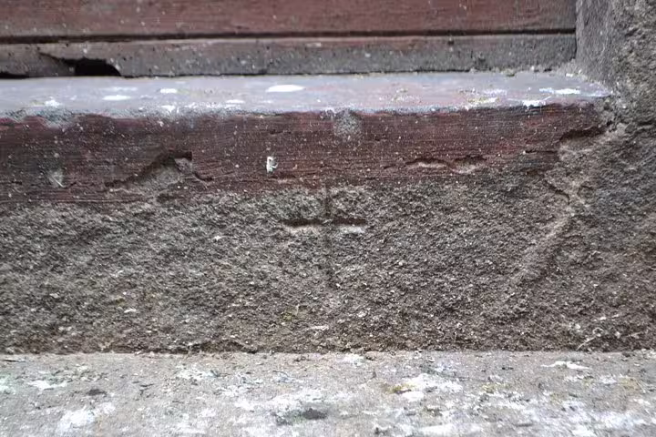 Uncover ancient Jewish symbols etched in stone during Porto's Jewish Heritage Walking Tour.