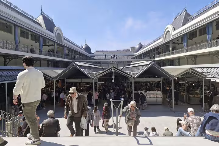 Explore bustling Mercado do Bolhão for a vibrant market experience on your Porto city tour with coastal views.