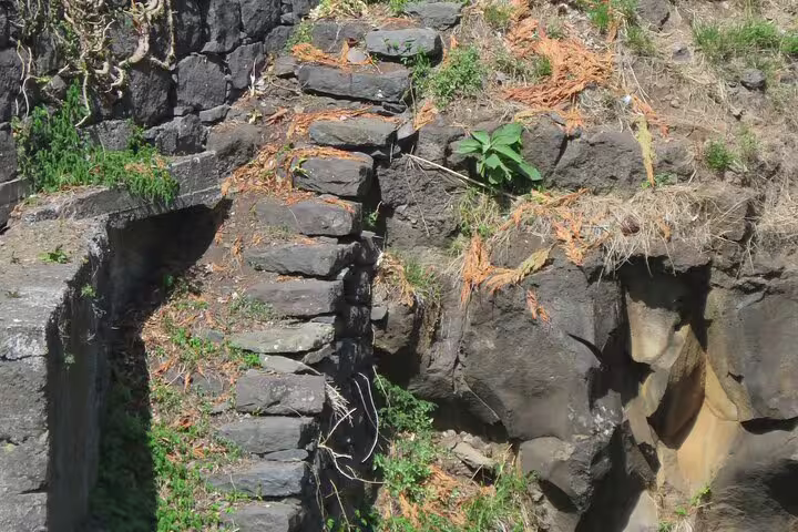 Rugged stone steps on a natural hillside in Porto Moniz, Madeira, showcasing the adventurous terrain of the 4x4 Jeep tour.