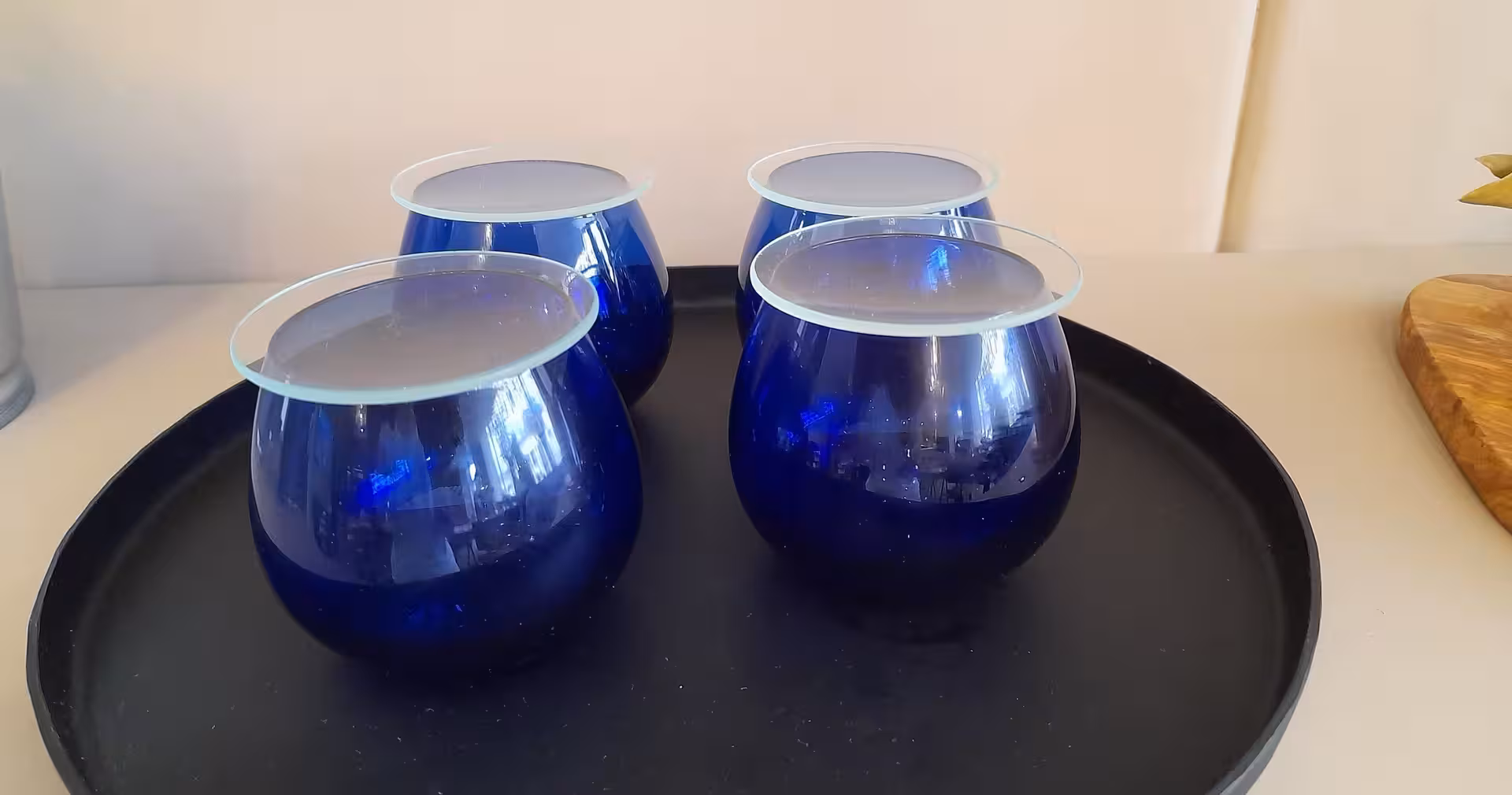 Blue olive oil tasting cups on a tray at Porto tasting venue, part of guided Porto olive oil tasting tour