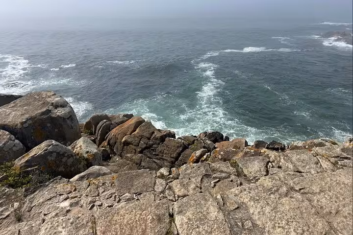 Rocky Atlantic shoreline near Porto, a scenic seaside stop on the half-day Porto & beach small-group tastings tour