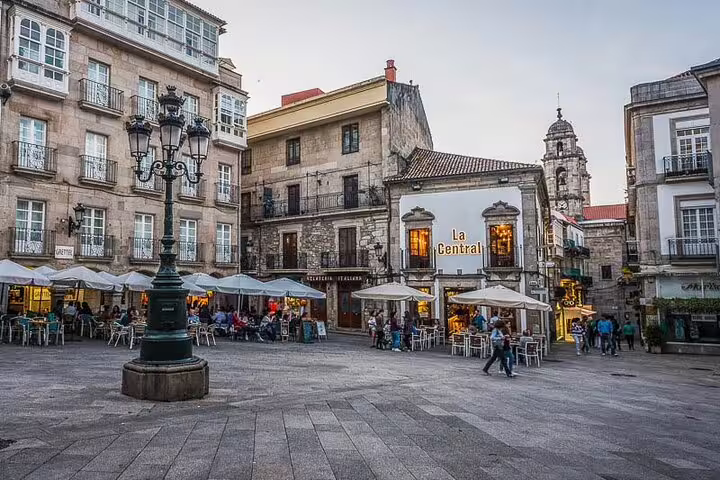 Charming square in a historic town along the Porto to Santiago Compostela route, perfect for enjoying local cafes.