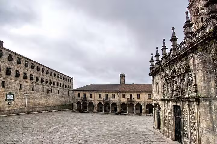 Quiet stone courtyard in Santiago de Compostela, a stop on Porto to Santiago private day trip tour
