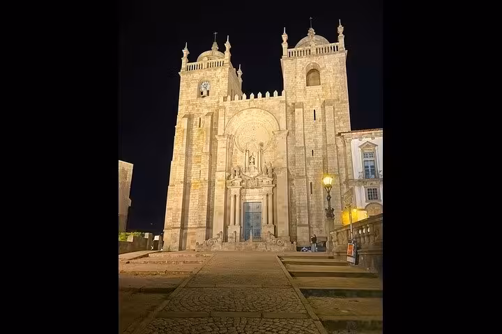 Porto Sé Cathedral at night in historic center, stop on private sunset tour with wine tastings, dinner and Fado show