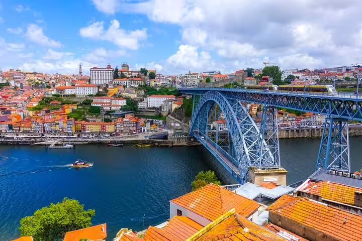 Marvel at Porto's stunning skyline and the iconic Dom Luís I Bridge on the scenic Six Bridges Cruise.