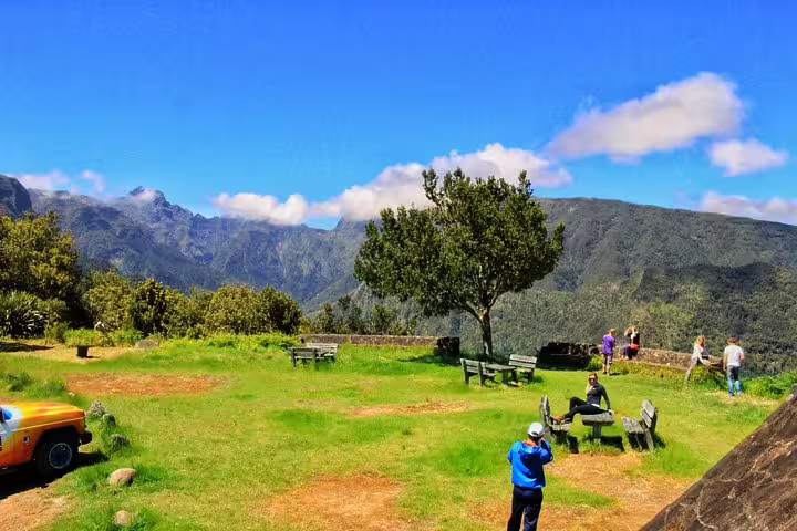 Visitors enjoy picturesque mountain views in Portugal on a scenic stop during a 4x4 full-day adventure tour.