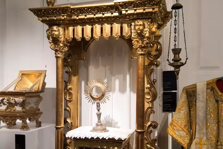 Gilded church reliquary and altar display inside Portugal museum, cultural stop on Portugal Snow tour