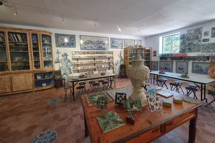Charming Portuguese ceramic art studio in Azeitão showcasing traditional tiles and pottery, ideal for cultural enthusiasts.