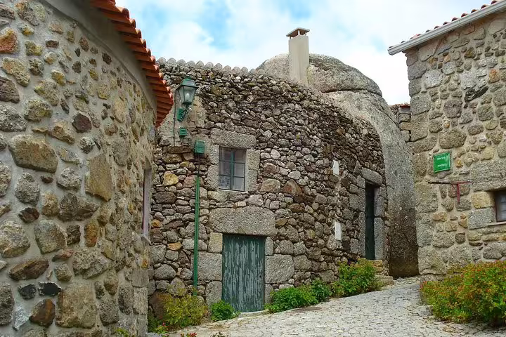 Charming stone houses in a quaint Portuguese historical village, perfect for a private full-day tour.