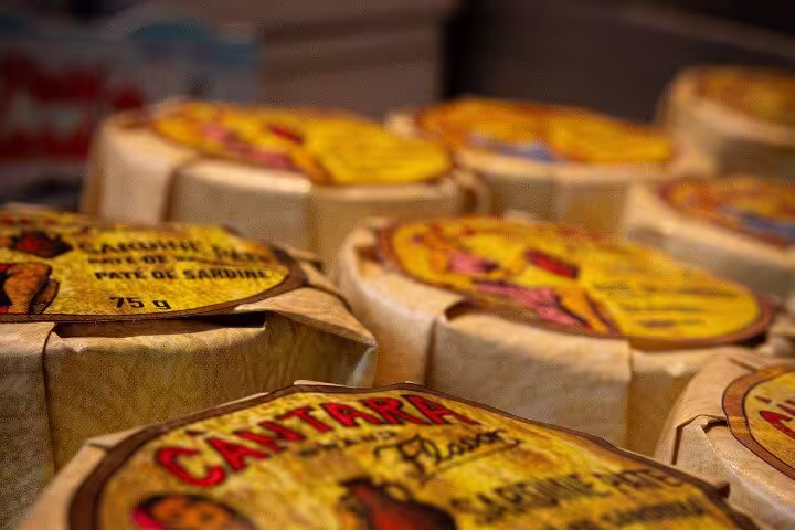 Selection of Portuguese sardine pâté tins, showcasing authentic local flavors on a Porto culinary journey.