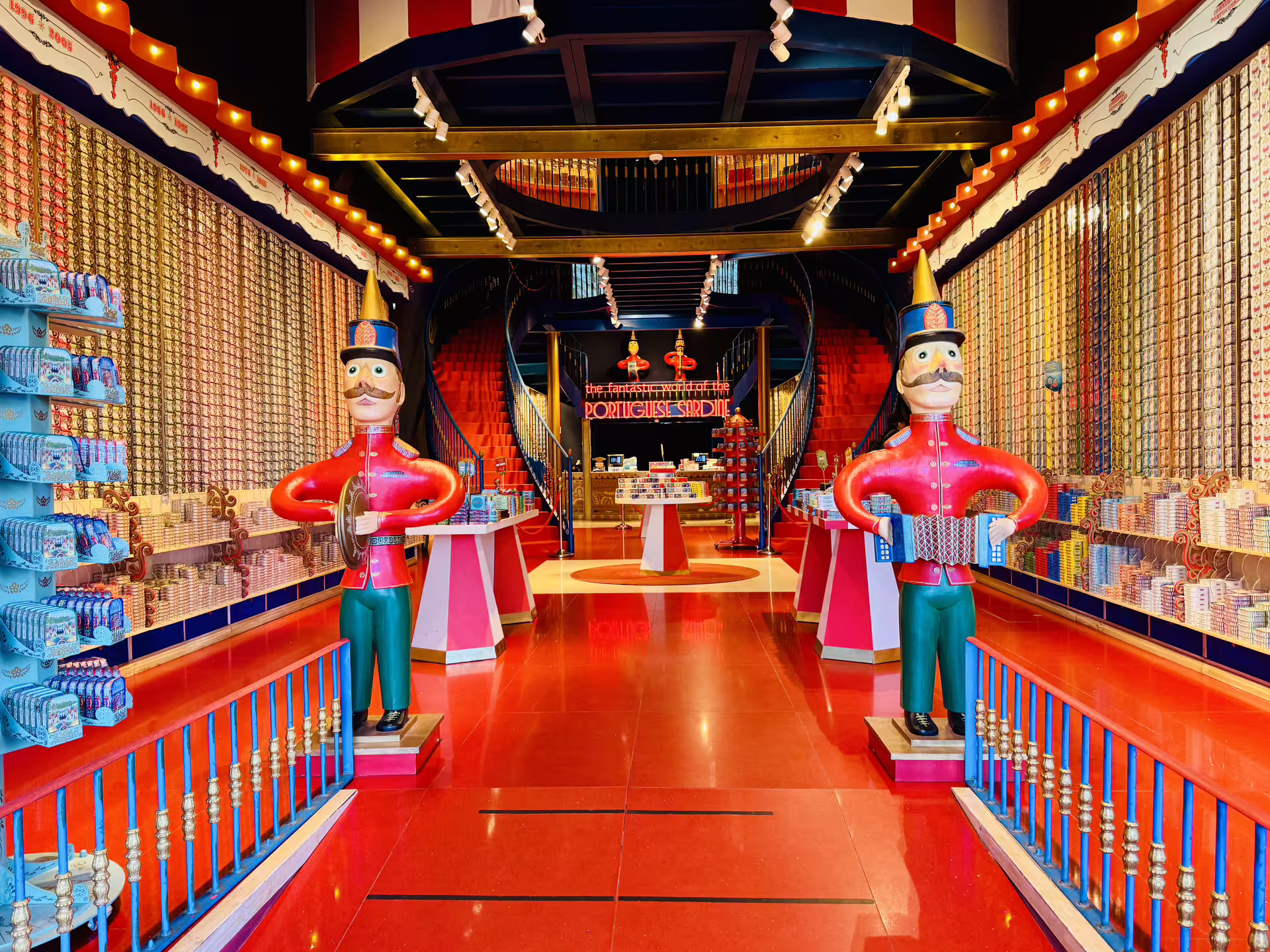 Colorful interior of a traditional Portuguese sardine shop, featuring vibrant displays and whimsical nutcracker statues.