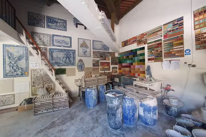 Traditional Portuguese tile workshop in Azeitão, showcasing vibrant azulejos as part of Lisbon's Arrábida and Setúbal tour.
