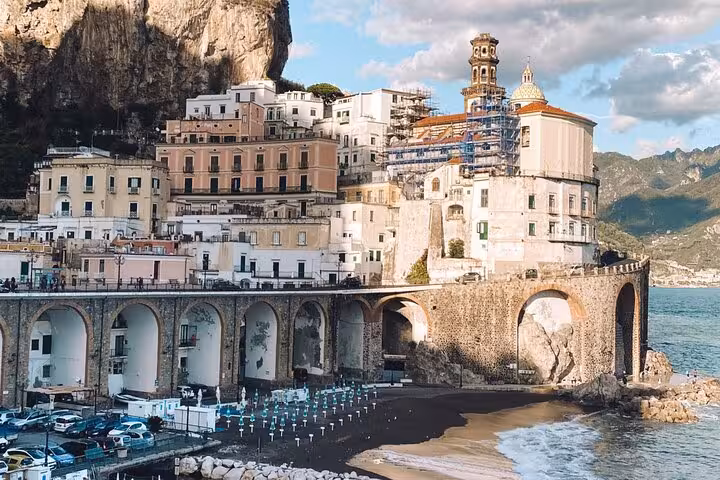 Scenic view of Positano's cliffside architecture overlooking the Mediterranean Sea on the Amalfi Coast tour.