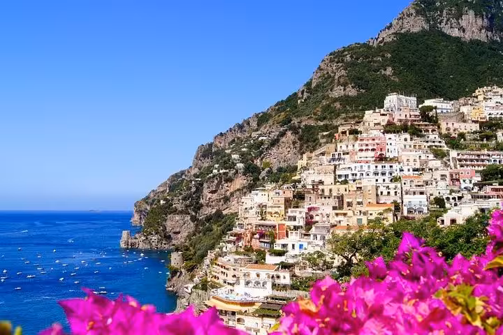 Breathtaking view of Positano's colorful cliffside buildings on the Amalfi Coast tour.
