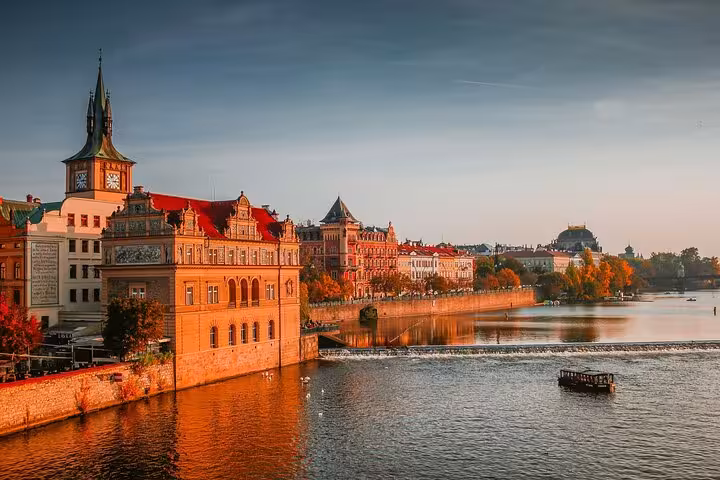 Prague riverside skyline at sunset near Old Town, scenic pre-game stroll for Slavia or Sparta Prague tour