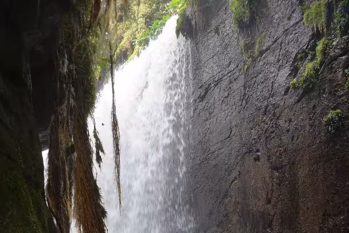Waterfall pouring through narrow canyon in Presidente Figueiredo, Amazonas, a highlight of Amazon Waterfalls tour