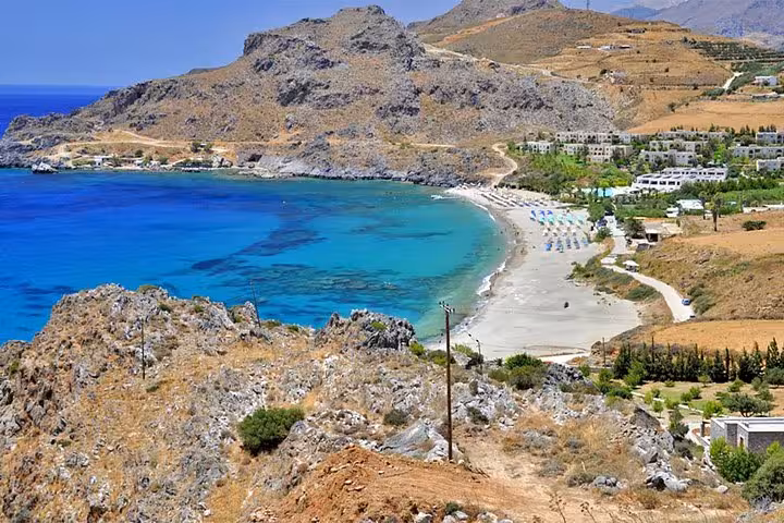 Panoramic view of Preveli Palm Beach lagoon and turquoise sea on a day trip from Rethymno, Crete