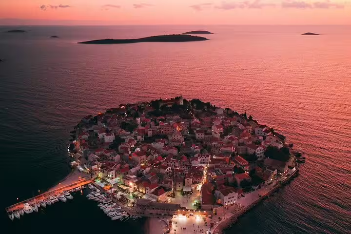 Aerial sunset over Primošten old town peninsula and marina, Croatia shore excursion with the best view