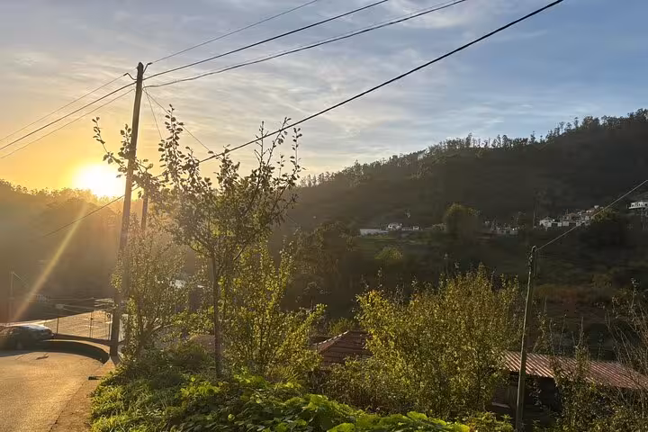 Golden sunset over rural mountain road and valley, scenic stop on private 4x4 shore excursion adventure