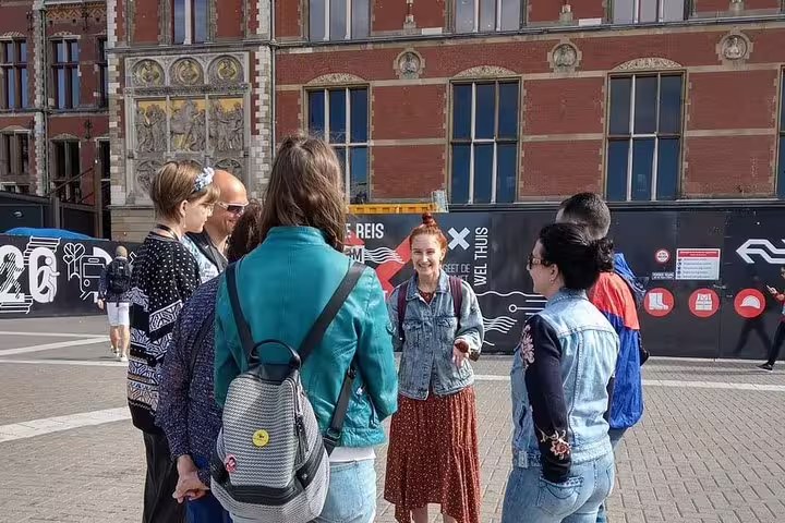 Private Amsterdam walking tour group with local guide in Museumplein, exploring the old city highlights