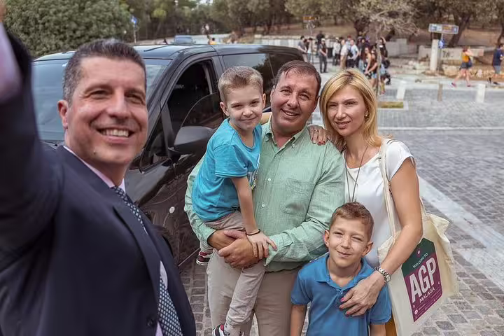 Private driver pickup with family by luxury van in Athens, perfect layover sightseeing ride from airport or port