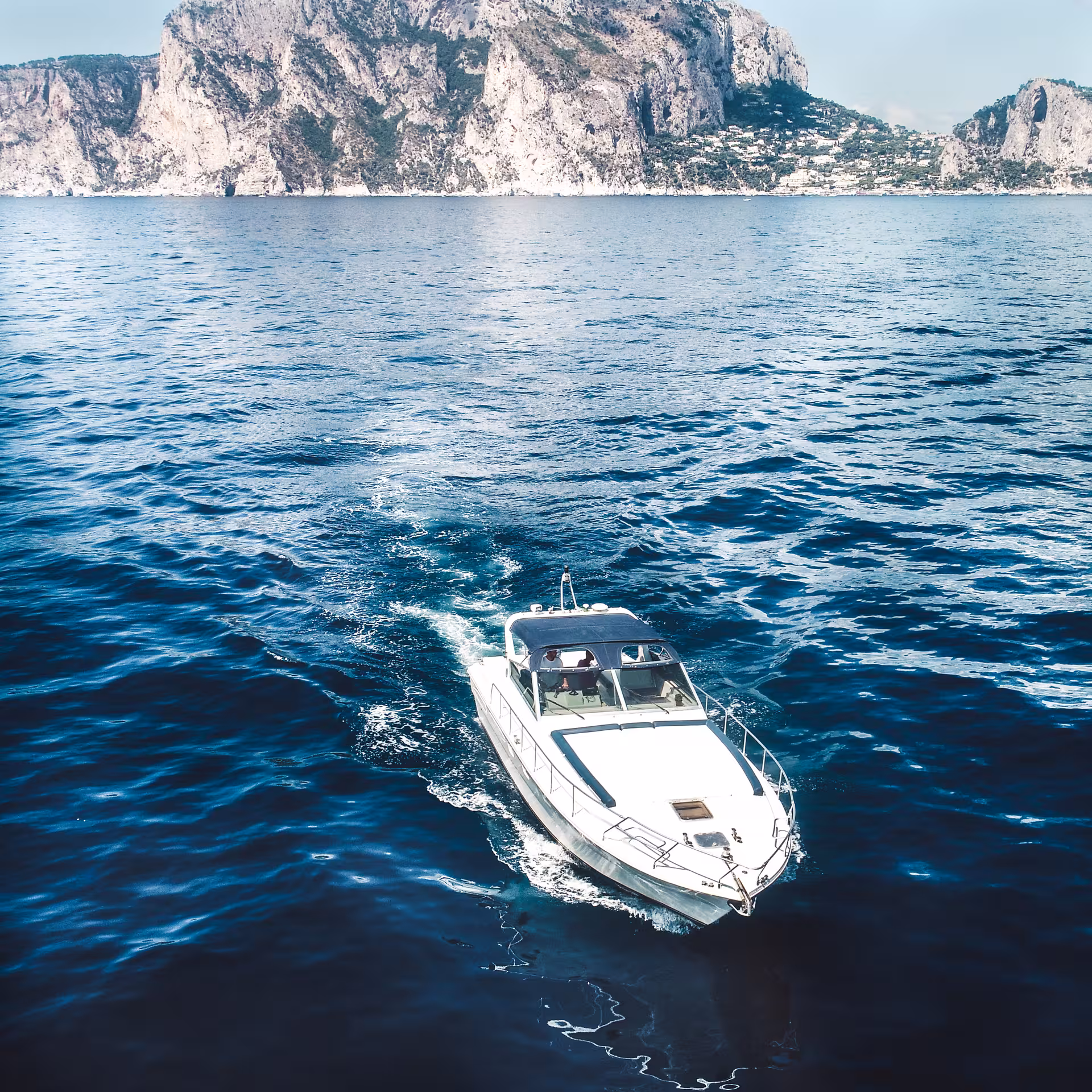 Private boat cruising from Sorrento with stunning cliff views en route to Positano and Amalfi Coast.
