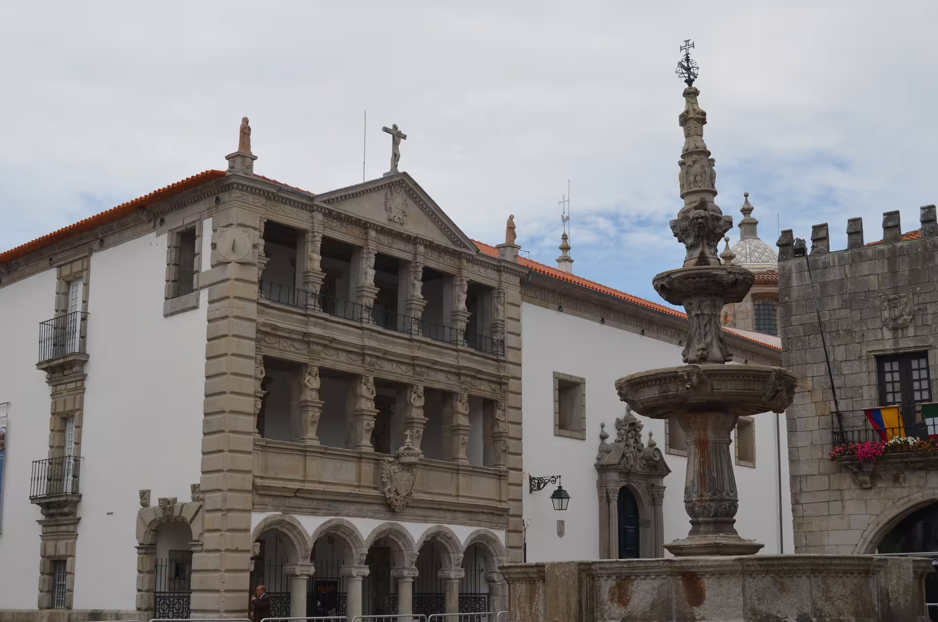 Historic architecture and ornate fountain in Viana do Castelo, Portugal, seen on a private car transfer from Porto.