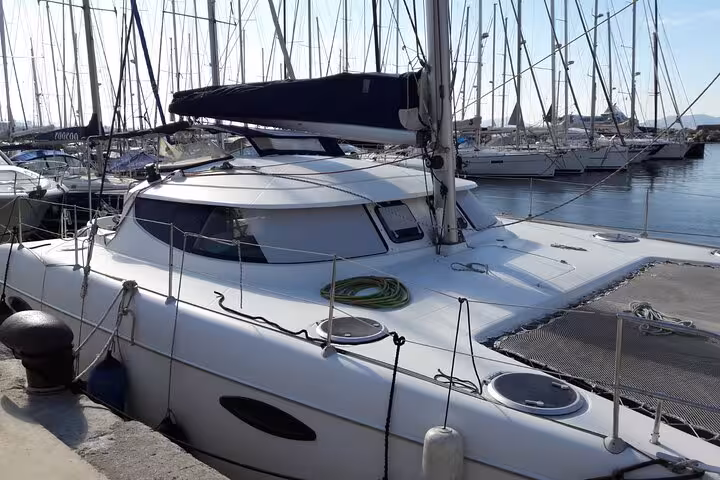 Private catamaran in Marseille marina, ready for full-day sailing tour to Calanques and Frioul islands