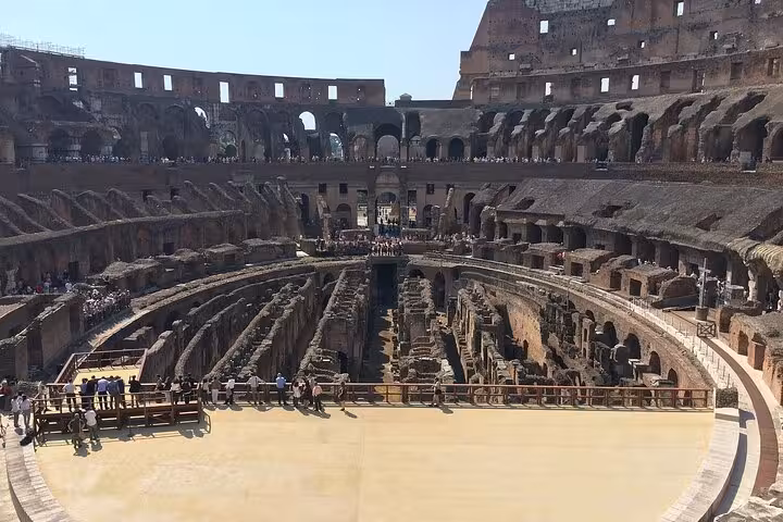 Private Colosseum Arena Tour view over arena floor and hypogeum tunnels, walk where gladiators fought in Rome
