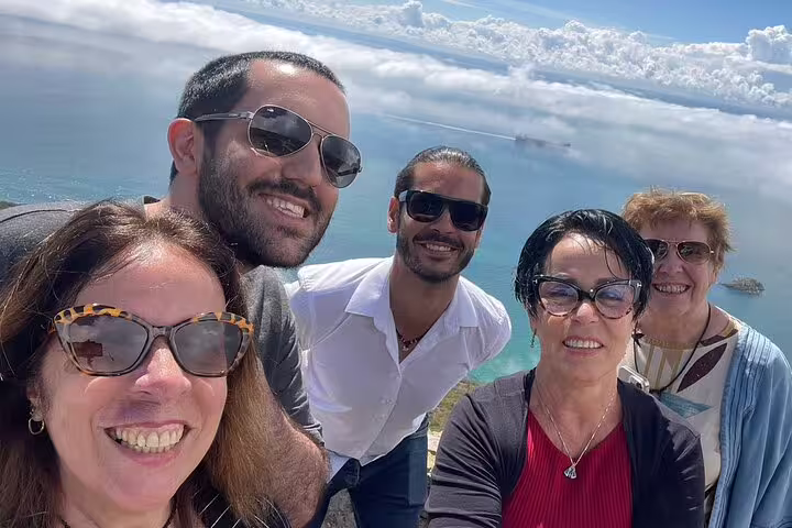 Group enjoying scenic views during a private day tour of Arrabida and Sesimbra with wine tastings near Lisbon.