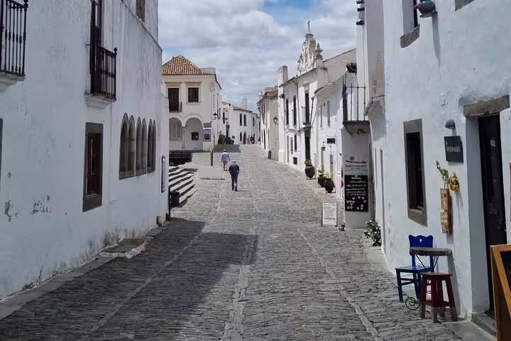 Explore the charming cobblestone streets of Monsaraz on a private day tour from Évora with a knowledgeable guide.