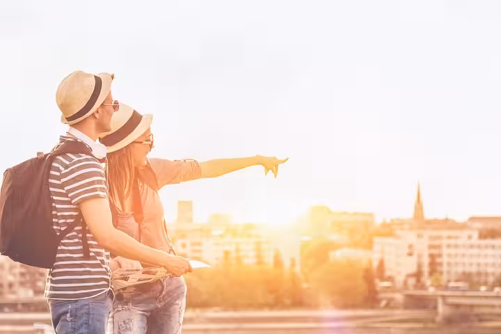 A couple enjoys a sunset view while exploring historic Florence on a private Renaissance tour.