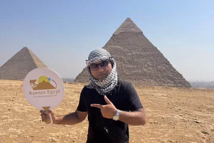 Private Giza Pyramids tour from Cairo with local guide at Khufu pyramid viewpoint in the desert