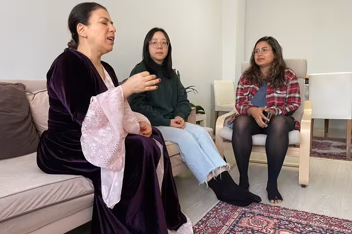 Intimate Istanbul dengbêj performance with guests seated indoors, private Kurdish music session cultural experience